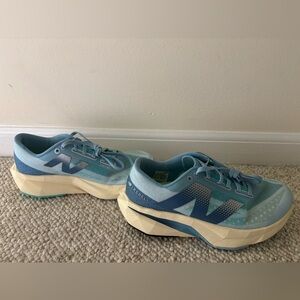 New Balance Fuel Cell Rebel v4 Blue Cream Shoes with Breathable Mesh